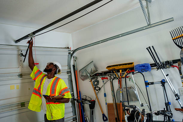 Professional Garage Door Panel Replacement technician working in Fremont, MI